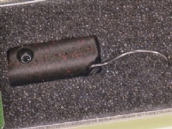 Dark olive pellet